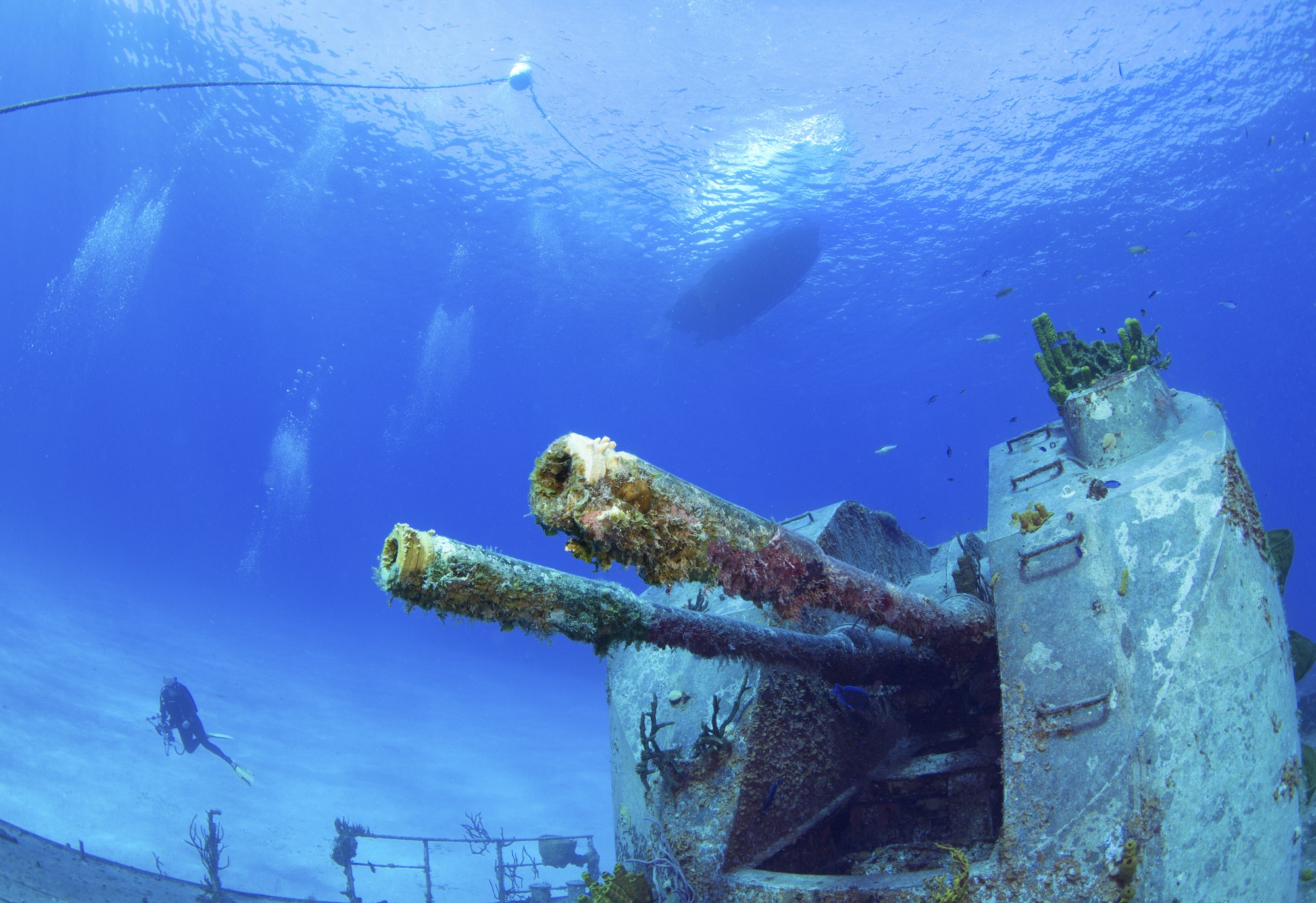 Extremely clear water and good visibility and objects on the seabed, a sunken warship creating an